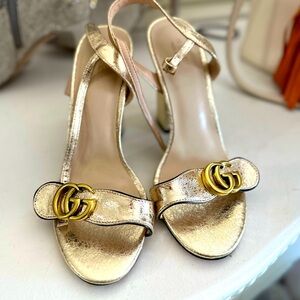 Gold heels.